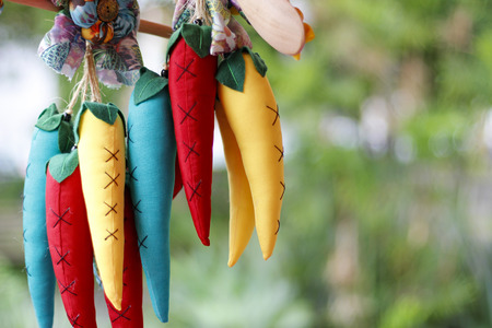 hand made decorative colorful cloth fake peppersの写真素材