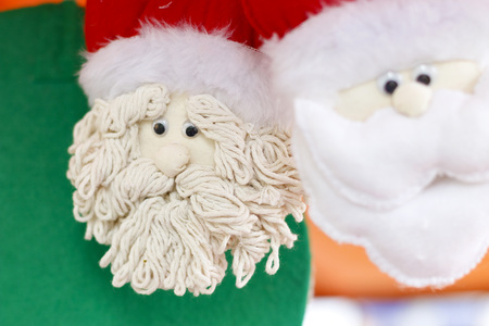 Detail of craftsmanship with Santa and Christmas arrangements for homeの写真素材