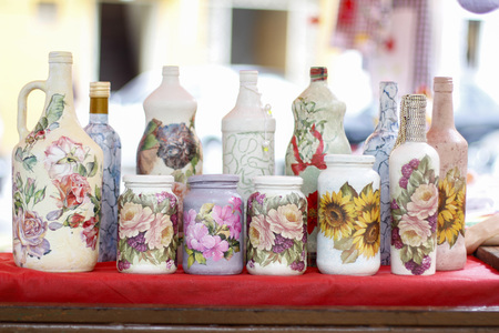 Craft of bottles with decorative illustrations made by handの写真素材