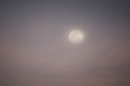 Full moon with fog - Mysterious clear moon with haze - Halloween backgroundの写真素材