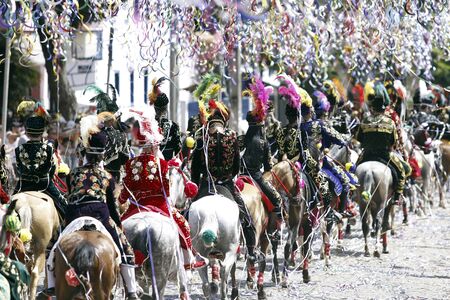 BONFIM, MG / BRAZIL - 2018-12-02: Carnival Parade in the State of Minas Gerais, city of Bonfim. Participants parade on horseback and wearing traditional costume - Carnival of Brazil - Carnaval a Cavalo.のeditorial素材