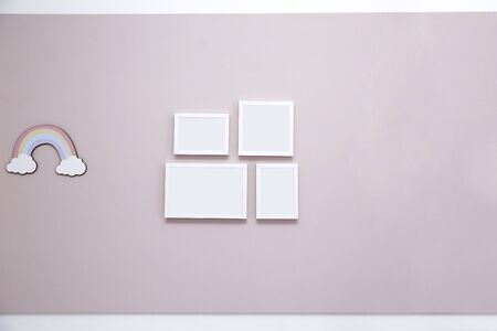 Light pink panel on wall with mockup frames - Girl's kids room - Pink wall in kids room for girl