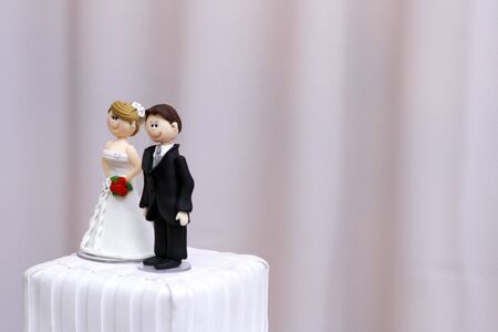 beautiful statues of bride and groom decorative wedding cake - wedding bride and groom couple doll in wedding cakeの写真素材