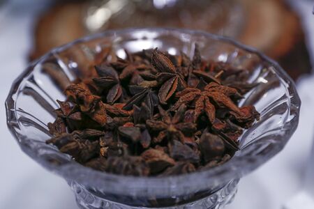 medicinal plant and spice star anise illicium verum in glass pot