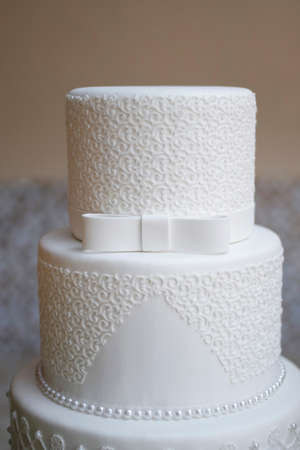 beautiful white party cake decorated with textures