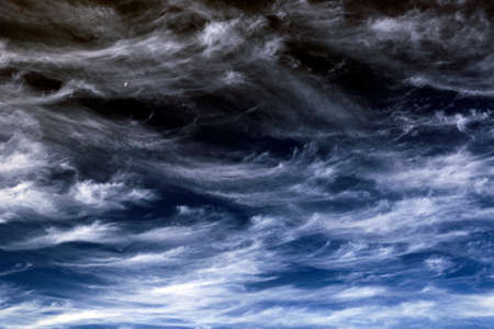White cirrus clouds in blue sky day and moon
