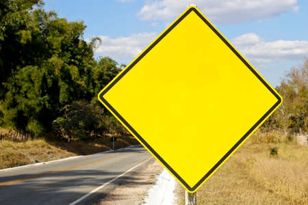 yellow blank traffic sign mockup with no alert indicationの写真素材