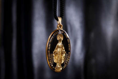 closeup medal of our lady of graces, catholic religious devotional objectの写真素材
