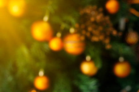 defocused abstract scene background in christmas tree and festive details. Concept of New Year and family festivitieの写真素材