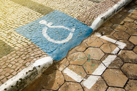 accessibility ramp for wheelchair users with accessibility symbol designの写真素材