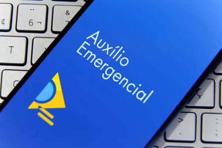 Minas Gerais, Brazil - March 20, 2021: Screen of the Emergency Aid application of the federal government of Brazilのeditorial素材