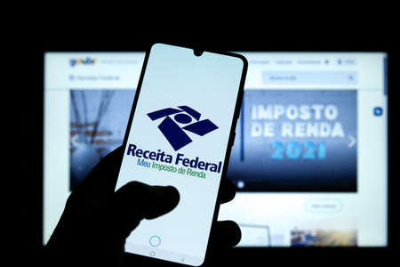 Minas Gerais, Brazil - March 21, 2021: customer used the income tax application of the federal revenue of brazil on mobile phoneのeditorial素材