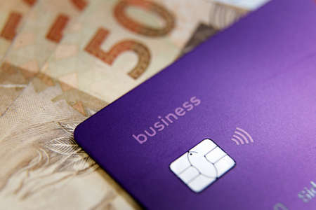 Minas Gerais, Brazil - March 25, 2021: Nubank Business credit card detail. Digital payment system - selective focusのeditorial素材