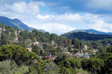 view of nature and buildings among the mountains from Monte Verde, district of Camanducaia, interior of Minas Geraisの写真素材