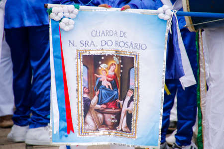 Oliveira, Minas Gerais, Brazil - August 8, 2018: congado - banner detail with image of Our Lady of the Rosary during processionのeditorial素材