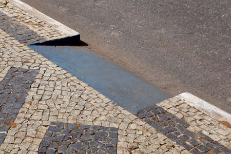 access ramp for wheelchair users in blue design in a city square