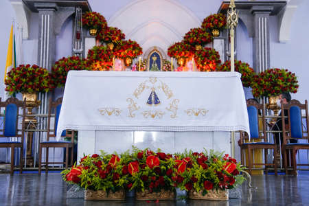 Oliveira, Minas Gerais - Brazil - October 12, 2021: altar decorated church with statue of the image of Our Lady of Aparecidaのeditorial素材