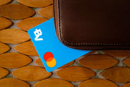 Minas Gerais, Brazil - April 19, 2021: BV bank logo credit card on wallet and Mastercard brandのeditorial素材
