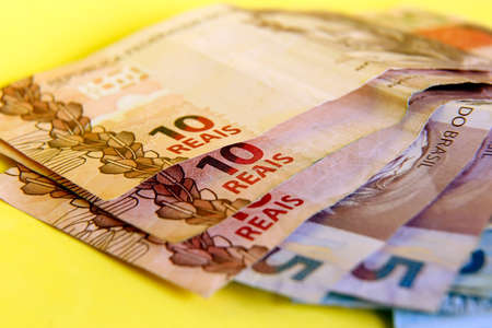 brazil money stacked on surface and selective focus - several real billsの写真素材