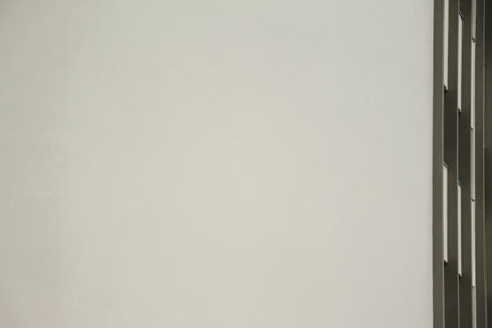 large wall of construction and details of doors and windows on the sideの写真素材