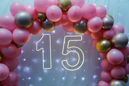 number fifteen with lights at 15th birthday party - front view - light partyの写真素材