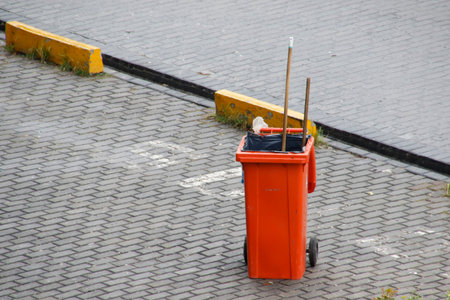 colorful trash bin used in garbage collection - urban garbage collection teamの写真素材
