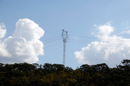 Electric power transmission tower and electrical power cablesの写真素材