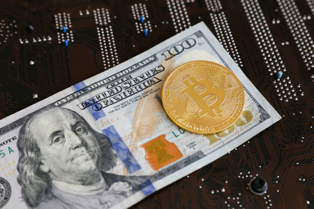 High-resolution $100 bill and gold Bitcoin coin. Finance, cryptocurrency, investments, digital...