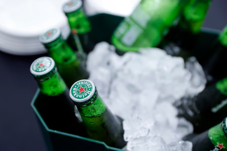 Minas Gerais, Brazil - October 8, 2025: Heineken pure malt beer bottles, refreshing golden lager in green bottle with red star, perfect for parties, celebrations, and relaxed momentsのeditorial素材