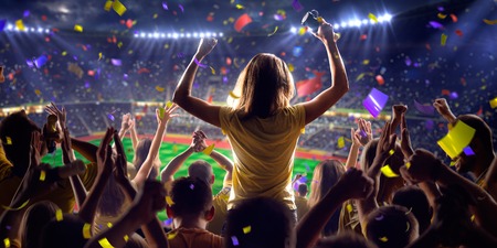 Fans on stadium soccer game Confetti and tinsel