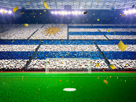 Flag Uruguay  of fans.Evening stadium arena soccer field championship win. Confetti and tinsel Blue Toningの写真素材