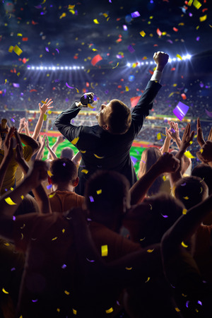 Fans on stadium soccer game Confetti and tinselの写真素材