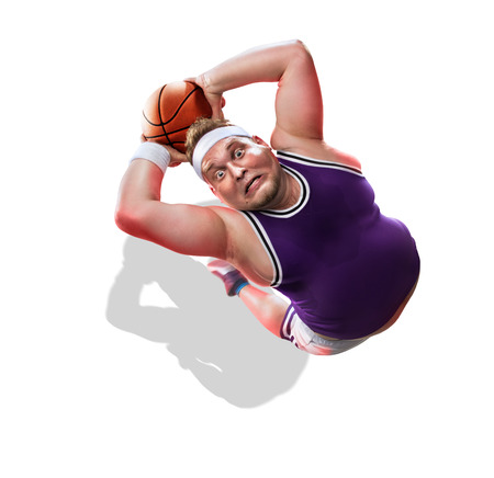 Fat non professional basketball player in action. Fun. isolated in white funの写真素材