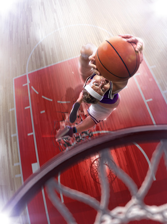 Fat non professional basketball player in action. Fun. Broken basketball court floor fun pictureの写真素材