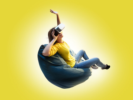 Young woman used Virtual reality helmet VR.の写真素材