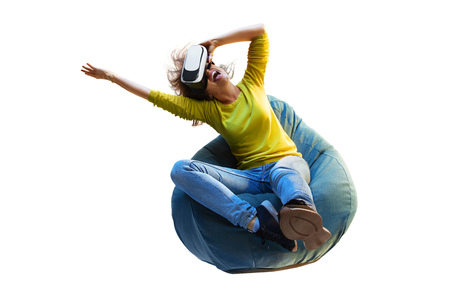 Young woman used Virtual reality technology VR. Isolated in whiteの写真素材
