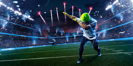 American football player celebrate tocuhdown on stadium. Sport wallpaper or advertisingの写真素材