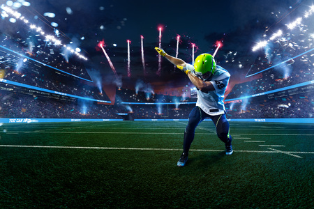 American football player celebrate tocuhdown on stadium. Sport wallpaper or advertisingの写真素材
