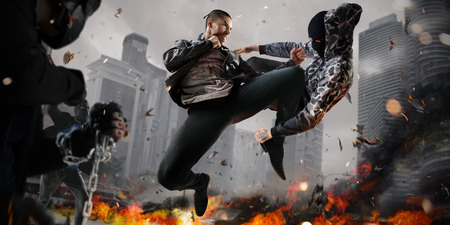 Street fighter super heroin action. around fire and smoky townの写真素材