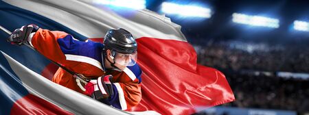 Czech Hockey Player in action around national flagsの写真素材
