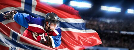 Norway Hockey Player in action around national flagsの写真素材