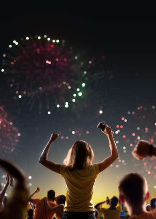 Fans celebrate in Stadium Arena night fireworksの写真素材