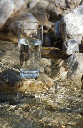 Water glass on a riverの写真素材