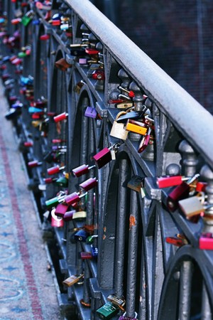 Locks on a bridge railingの写真素材