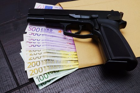 Pistol and Banknotesの写真素材
