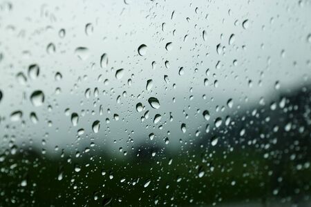 Raindrops on a car windowの写真素材