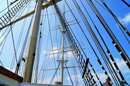 Main mast of a sailing ship under blue skyの写真素材