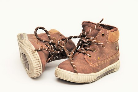 New children's shoes isolated on white backgroundの写真素材