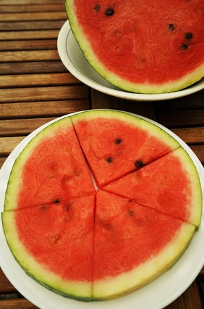 Fresh watermelon sliced ââon a wooden tableの写真素材