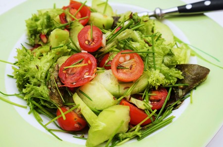 Fresh mixed vegetarian salad on a plateの写真素材